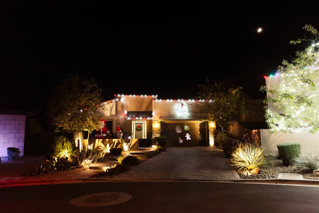 Candy cane red and white Christmas light installation on a Las Vegas home