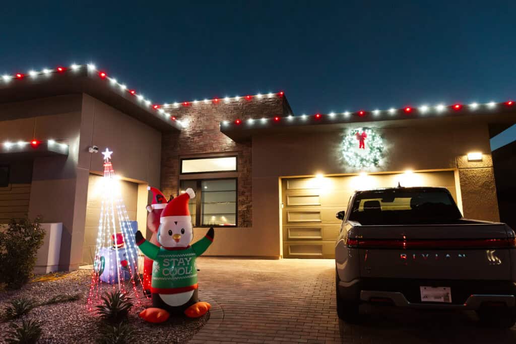 Candy cane red and white Christmas light installation on a Las Vegas home