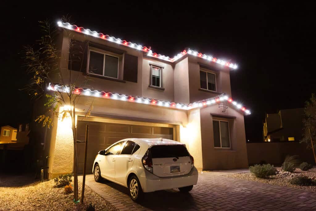 Candy cane red and white Christmas light installation on a Las Vegas home