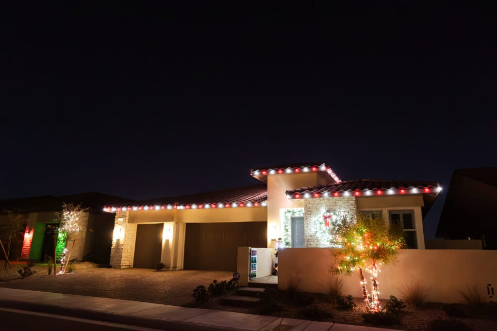 Candy cane red and white Christmas light installation on a Las Vegas home