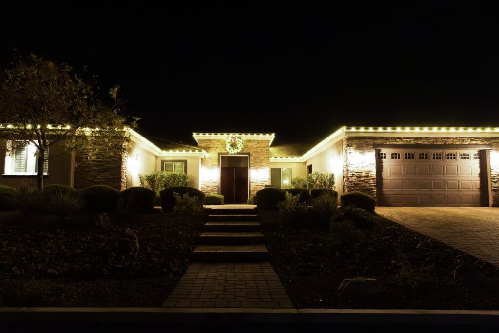 Warm white Christmas light installation on a Las Vegas home