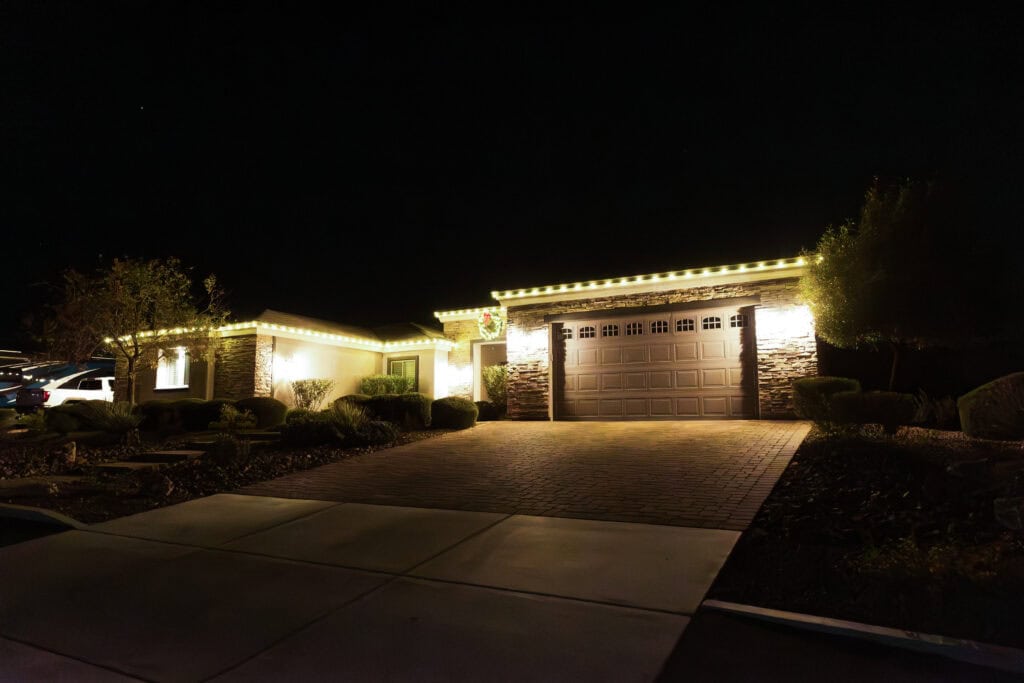 Warm white Christmas light installation on a Las Vegas home