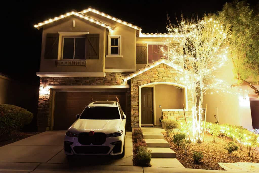 Warm white Christmas light installation on a Las Vegas home