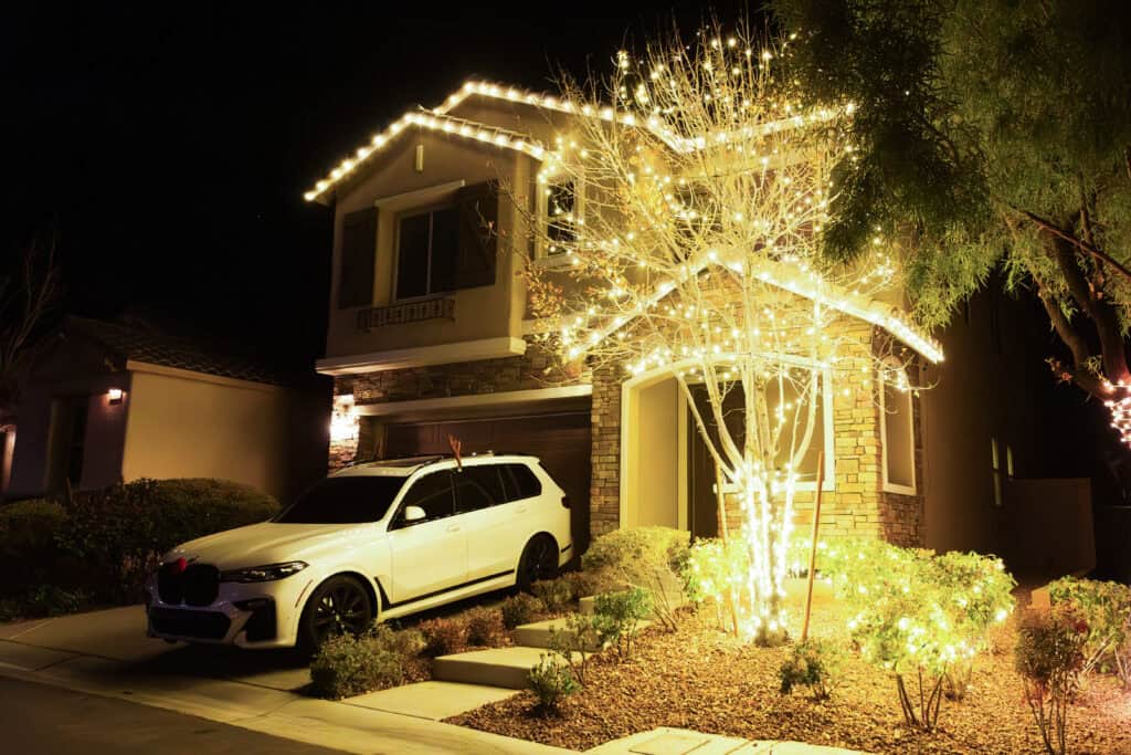Warm white Christmas light installation on a Las Vegas home