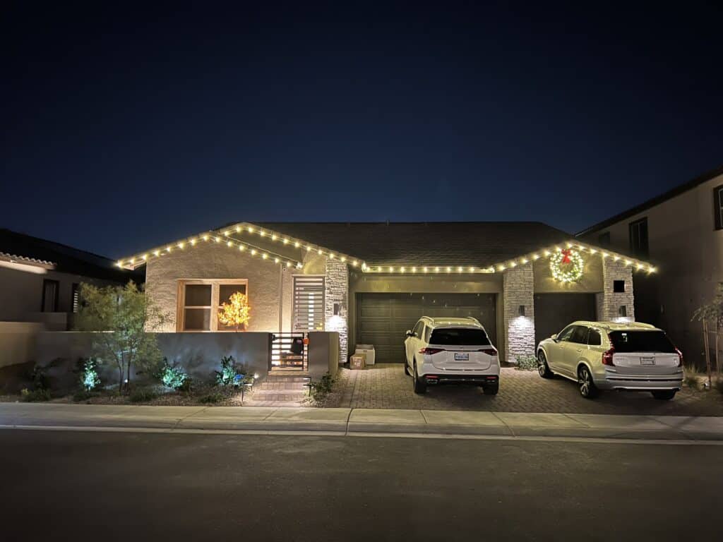 Warm white Christmas light installation on a Las Vegas home