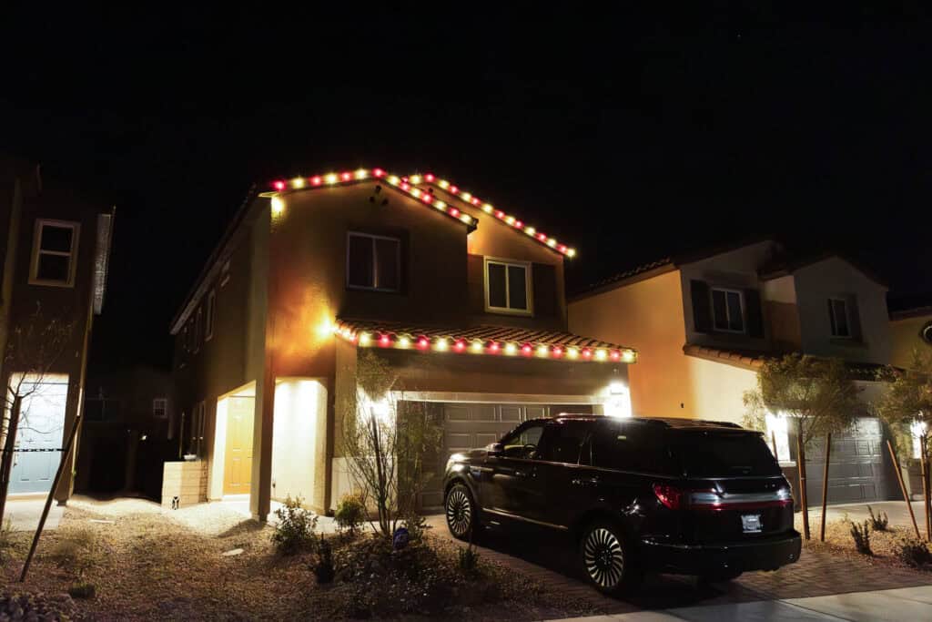Candy cane red and white Christmas light installation on a Las Vegas home