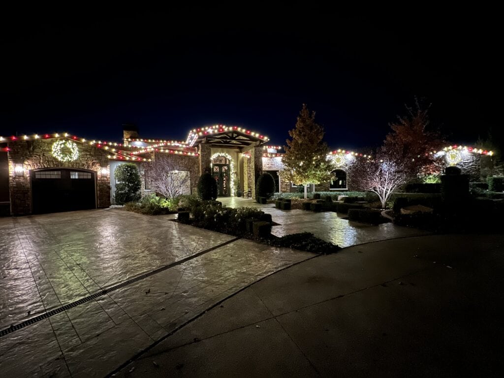 Warm White and Red Candy Cane Christmas Lights installed on a ranch style home in Las Vegas