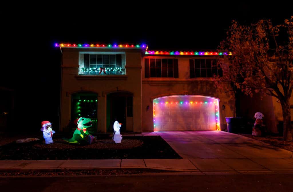 Multi-color custom Christmas light installation on a Las Vegas home