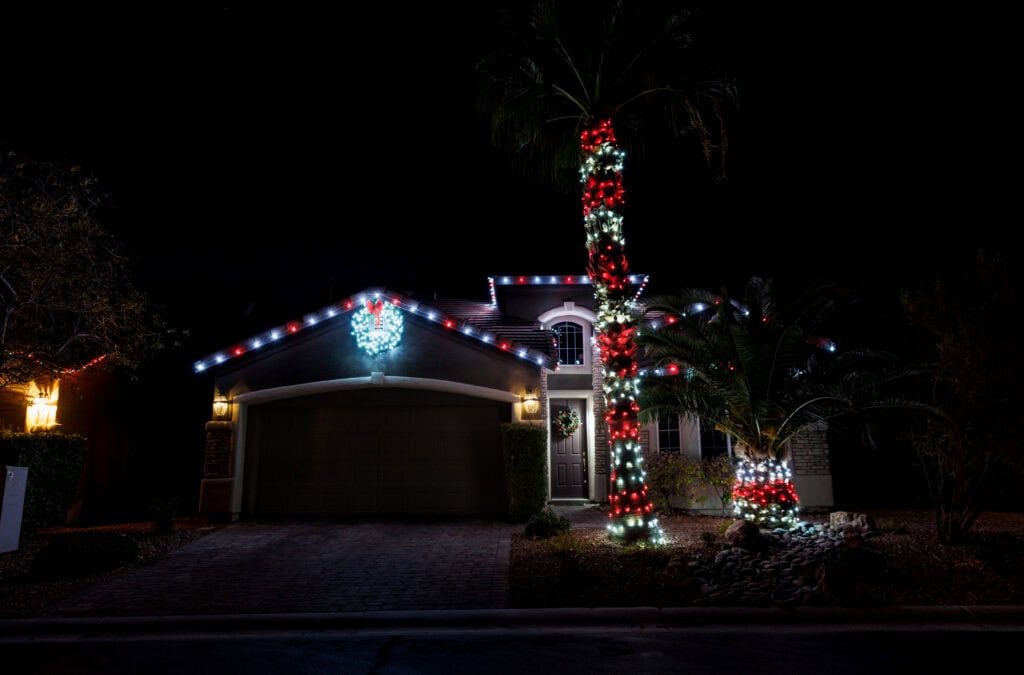 Multi-color custom Christmas light installation on a Las Vegas home