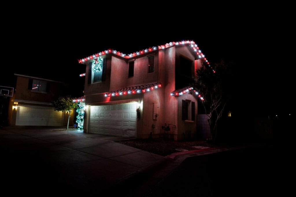 Candy cane red and white Christmas light installation on a Las Vegas home