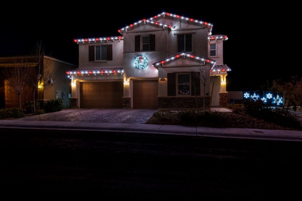 Candy cane red and white Christmas light installation on a Las Vegas home