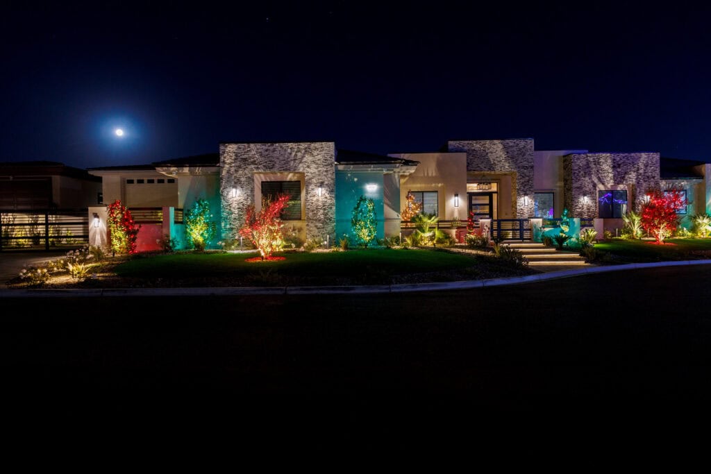 Multi-color custom Christmas light installation on a Las Vegas home
