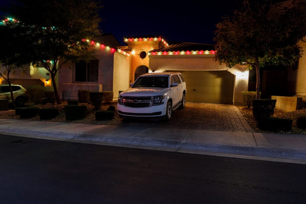 Multi-color custom Christmas light installation on a Las Vegas home