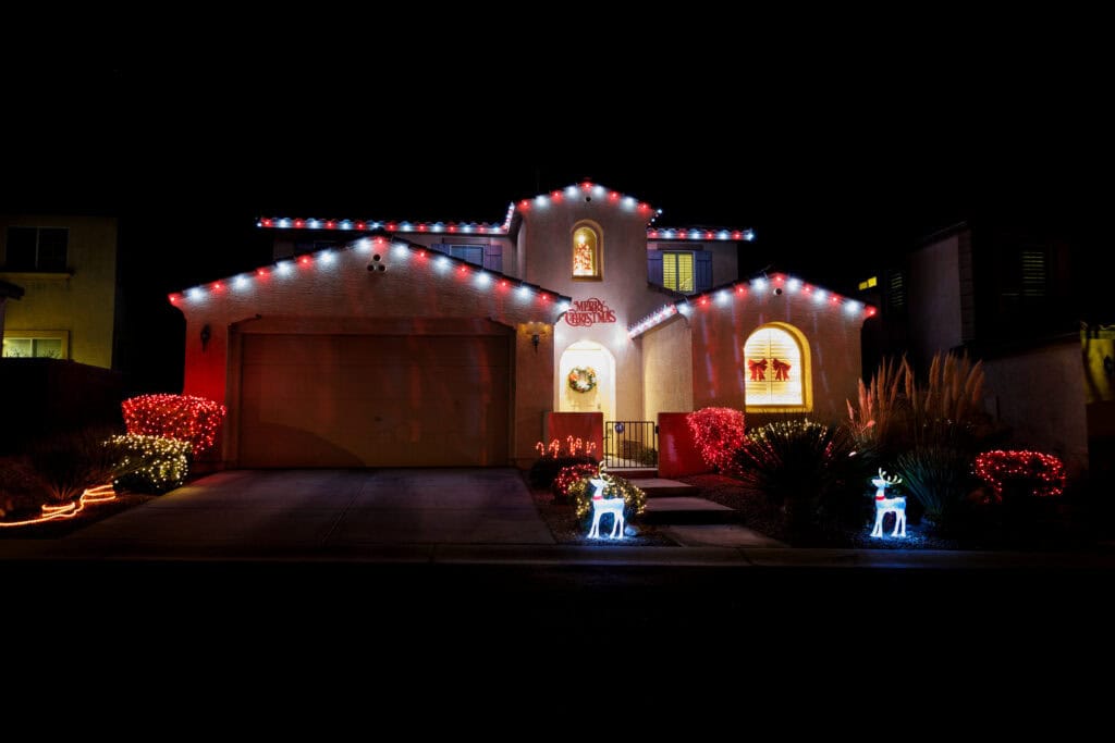 Candy cane red and white Christmas light installation on a Las Vegas home