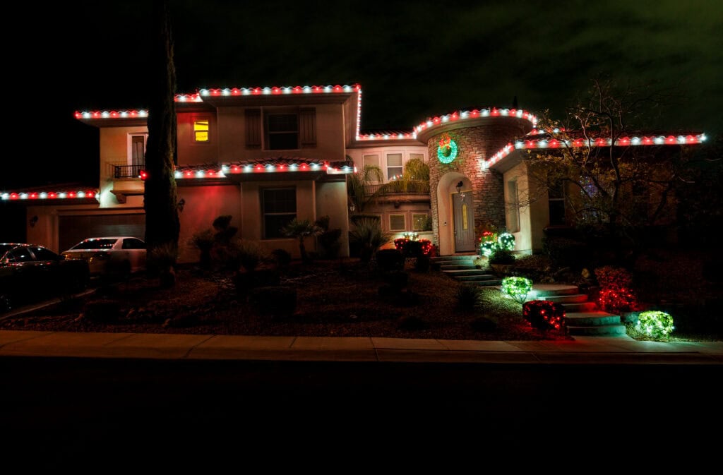 Multi-color custom Christmas light installation on a Las Vegas home