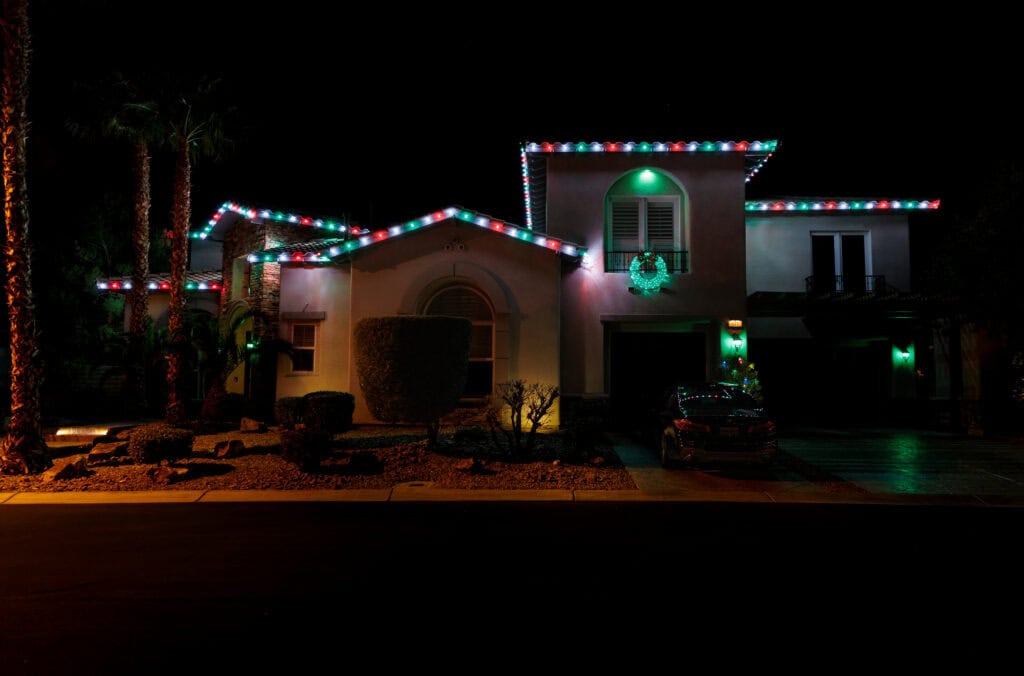 Multi-color custom Christmas light installation on a Las Vegas home