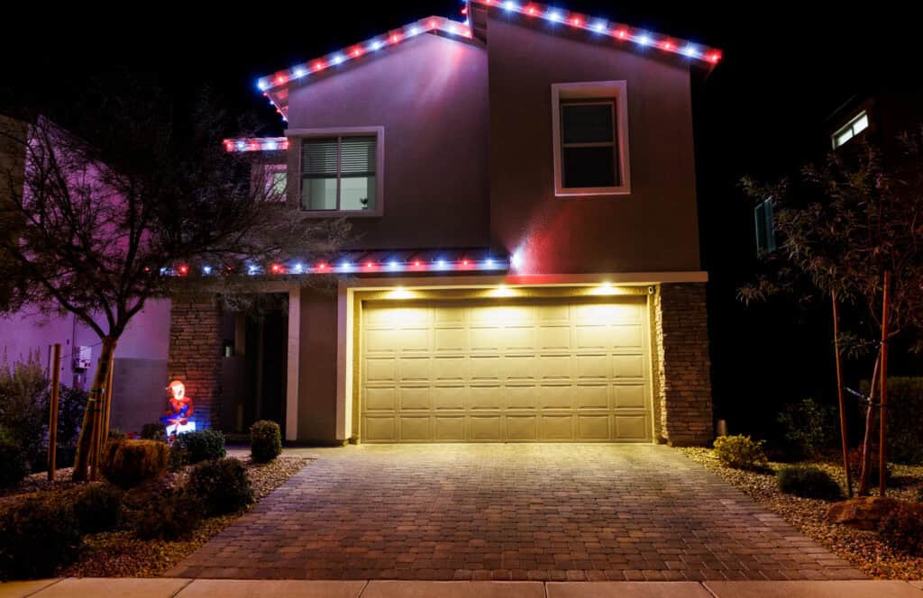 Candy cane red and white Christmas light installation on a Las Vegas home