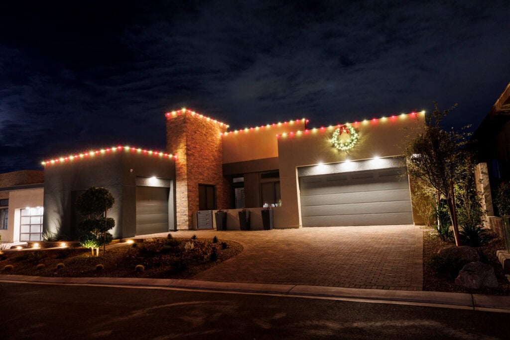 Candy cane red and white Christmas light installation on a Las Vegas home