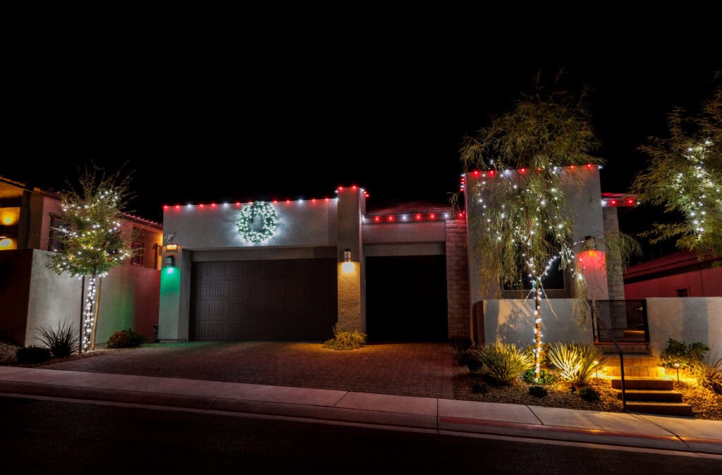Candy cane red and white Christmas light installation on a Las Vegas home